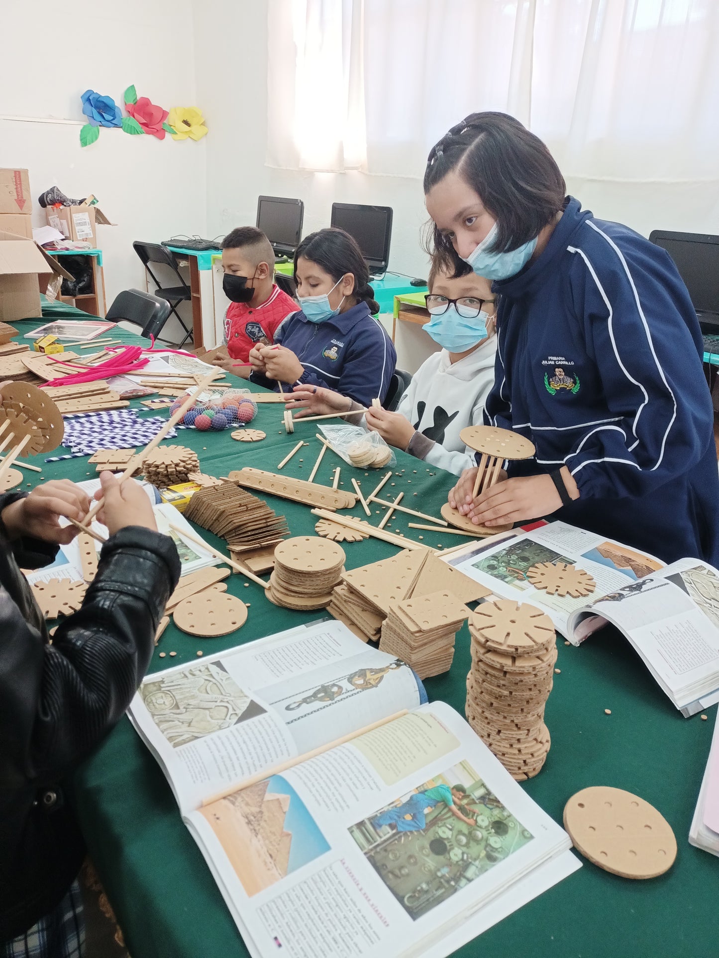 Students performing a project with Kitco Classroom