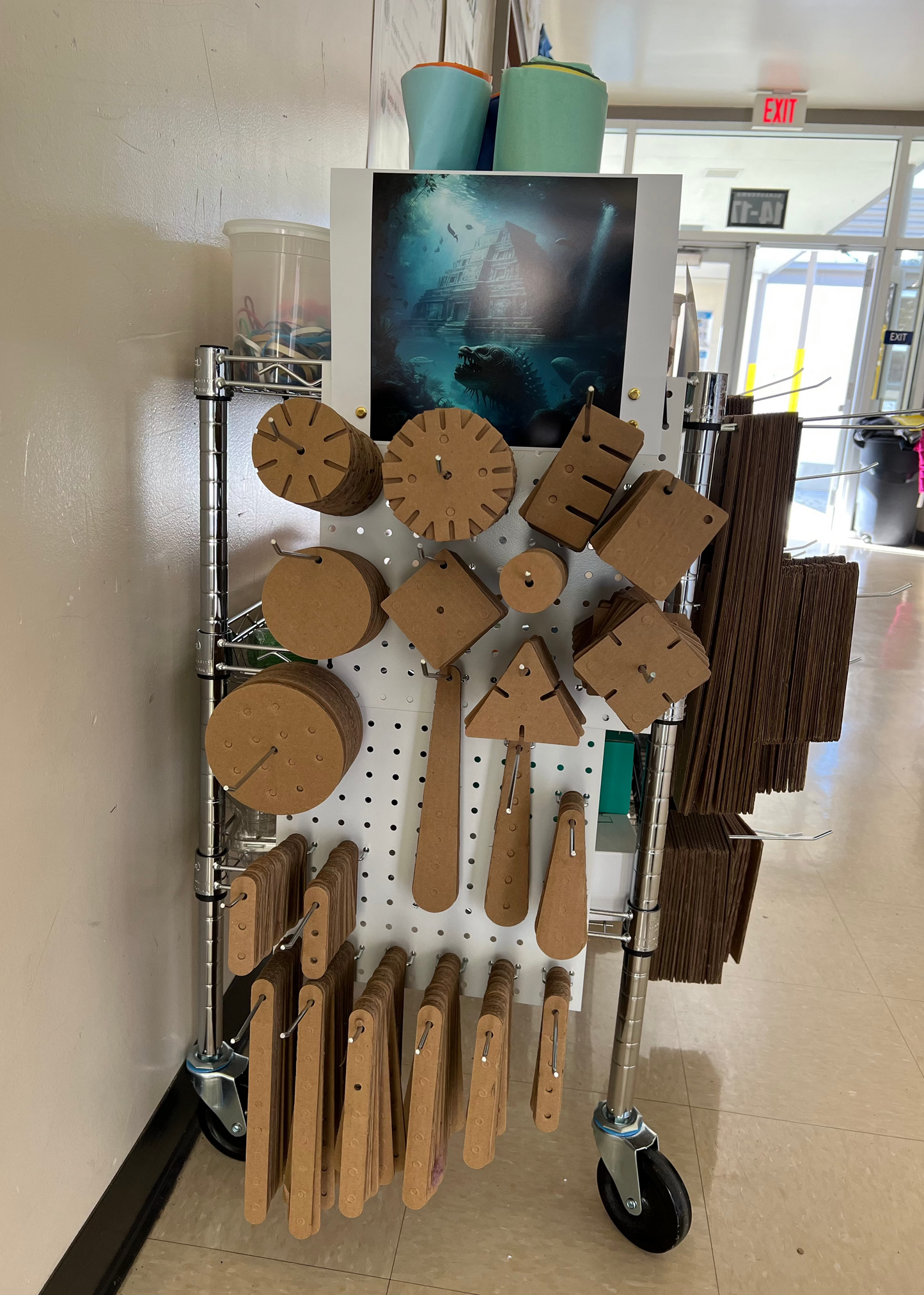 A cart with 7 pegboards carrying KitCo products