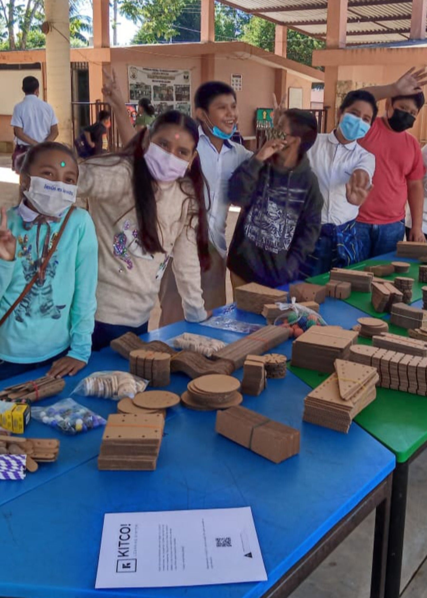 Happy learners, ready to work with their Kitco School Kit